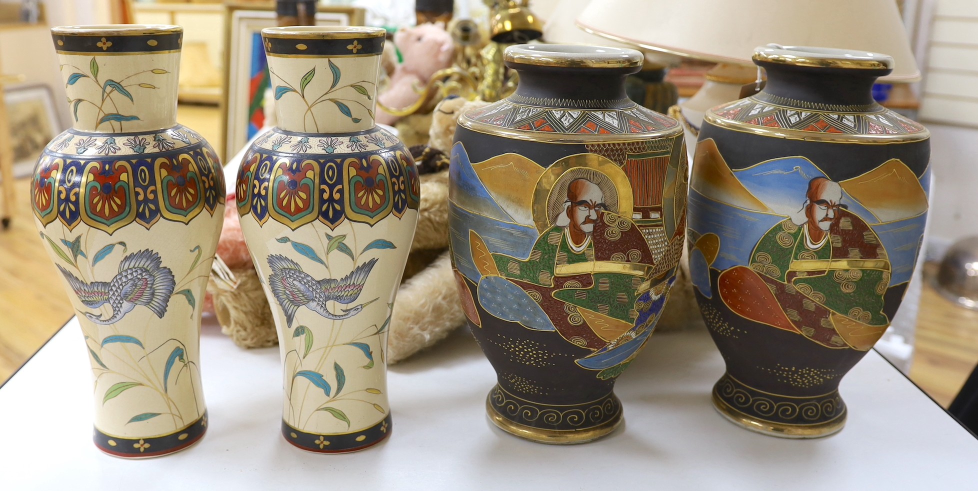 Two pairs of Japanese vases. Tallest 38cm